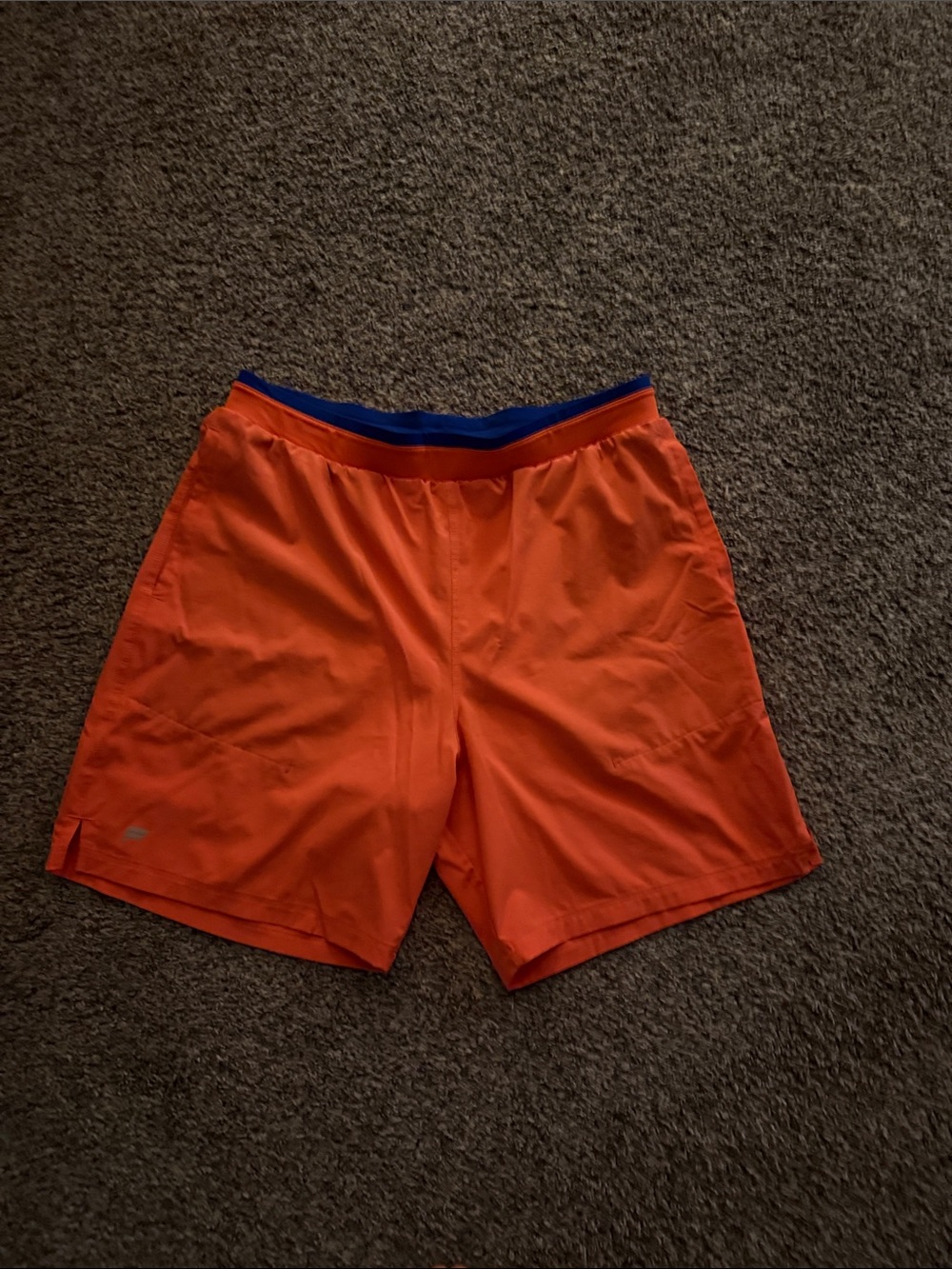 Women’s Orange Athletic Shorts with Blue Waistband